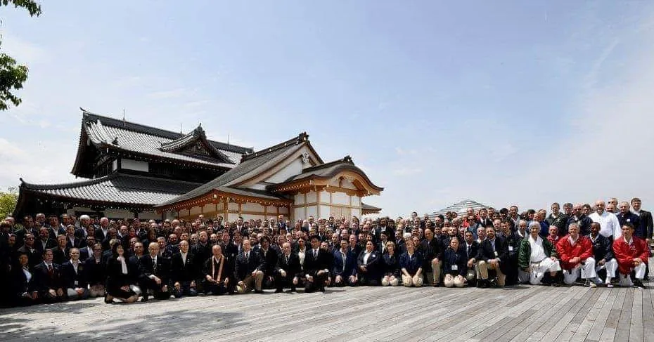 Large group photo at a temple hall, Kyoto, Japan, 2016