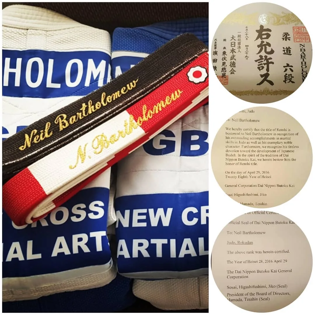 Belt embroidered 'Neil Bartholomew' with the DNBK certificate (6th Dan, Renshi, Japan 2016)